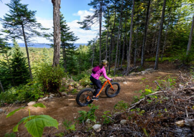 On property trail with mountain biker.