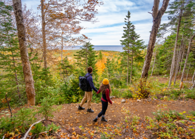 Hikers on mountain trails with ocean views